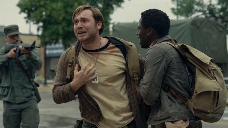 Cooper Hoffman as Ray Garraty and David Jonsson as Pete McVries in The Long Walk