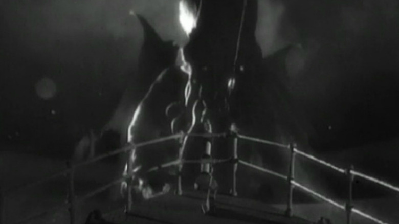 Cthulhu hovering over a boat in The Call of Cthulhu