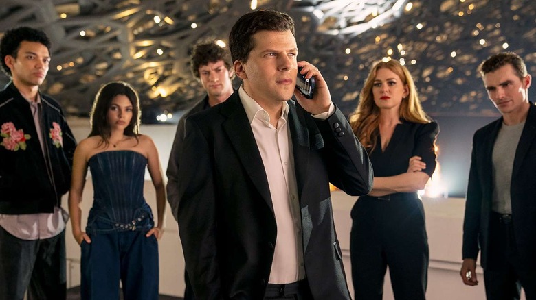 Atlas on the phone with Charlie June Bosco Henley and Jack behind him in Now You See Me, Now You Don't