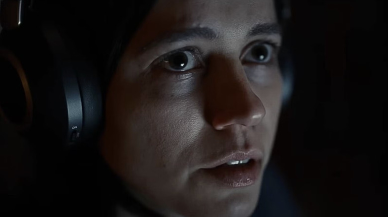 Evy listening to the audio files in undertone