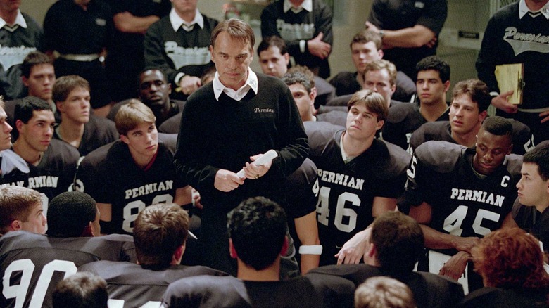 Billy Bob Thornton as Coach Gary Gaines is surrounded by his Permian Panthers in Friday Night Lights
