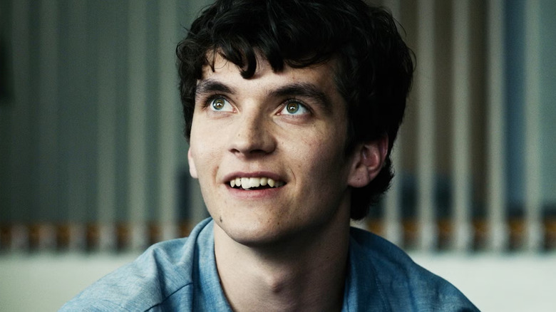 Stefan smiling and looking up in Bandersnatch