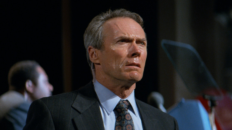 Clint Eastwood's Frank Horrigan looks confused in closeup in In the Line of Fire