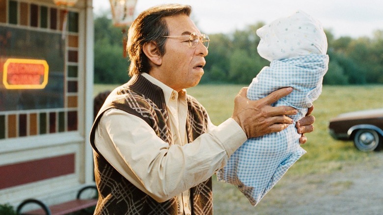 Eddie Murphy in makeup and prosthetics as a Chinese man in Norbit