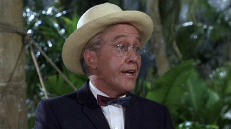 Strother Martin's George Barkley is seen standing in front of shrubbery in Gilligan's Island