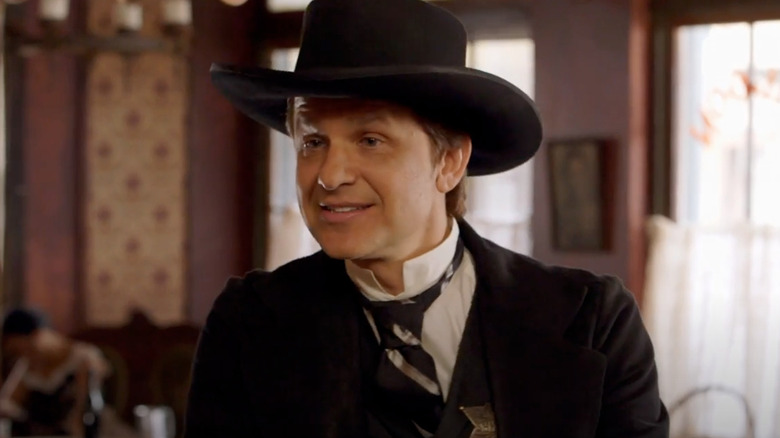 John Lehr as Sheriff John Henry Hoyle smiling on Quick Draw