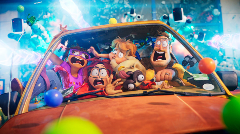Maya Rudolph as the voice of Linda, Danny McBride as Rick, Beck Bennett as Eric, Abbi Jacobson as Katie, and Michael Rianda as Aaron crammed into a car in The Mitchells vs the Machines