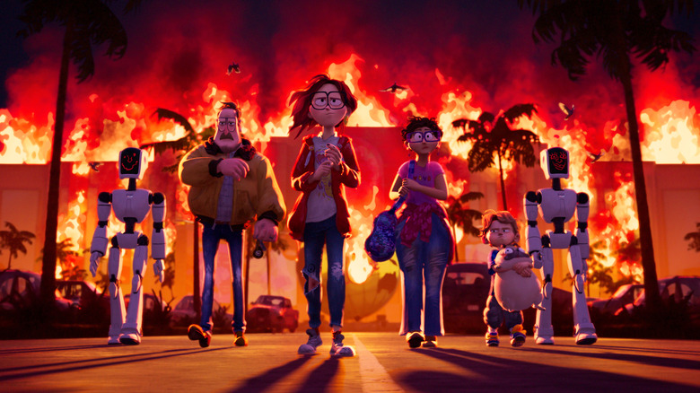 Fred Armisen as the voice of Deborahbot 5000, Maya Rudolph as Linda, Danny McBride as Rick, Beck Bennett as Eric, Abbi Jacobson as Katie, and Michael Rianda as Aaron walking away from a building on fire in The Mitchells vs. the Machines
