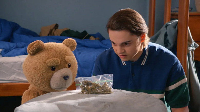 Ted and John staring at a bag of weed