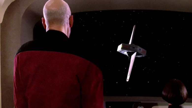Picard looking at a weird Kataanian probe in Star Trek: The Next Generation