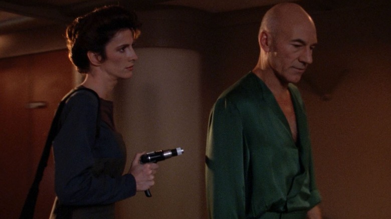 Kelsey keeping Picard at laser-point on Star Trek: The Next Generation