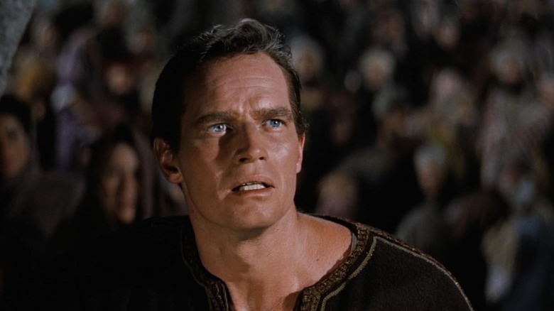 Charlton Heston as Judah Ben-Hur looking concerned in Ben-Hur