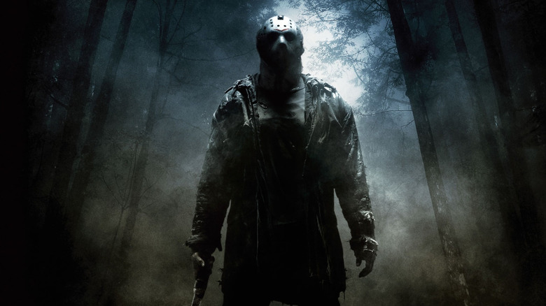 Jason Voorhees in the woods on the poster for Friday the 13th (2009)