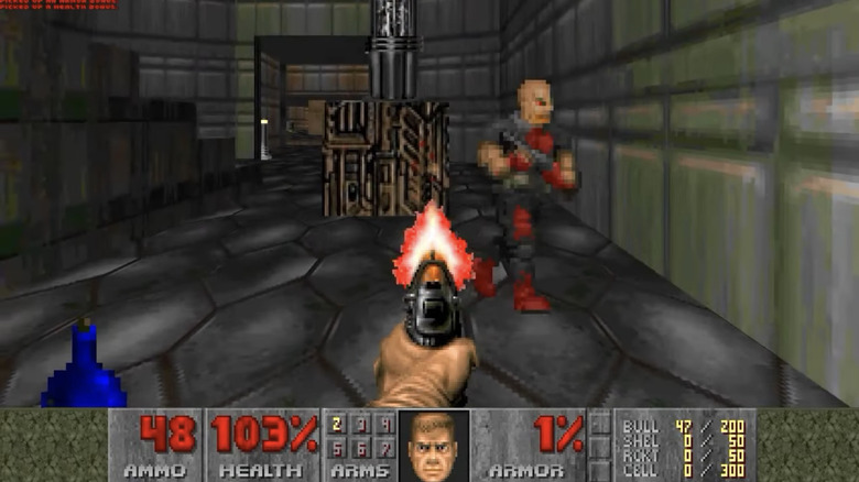 Doomyguy wields a pistol as an enemy soldier runs in Doom