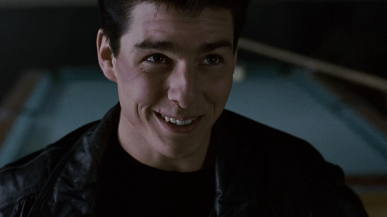 Tom Cruise's Vincent Lauria smiles in closeup in The Color of Money