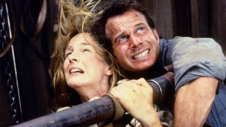Bill Paxton's Bill holding Helen Hunt's Jo at the end of Twister
