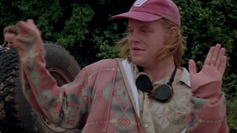 Phillip Seymour Hoffman's Dusty holding his hands up in Twister