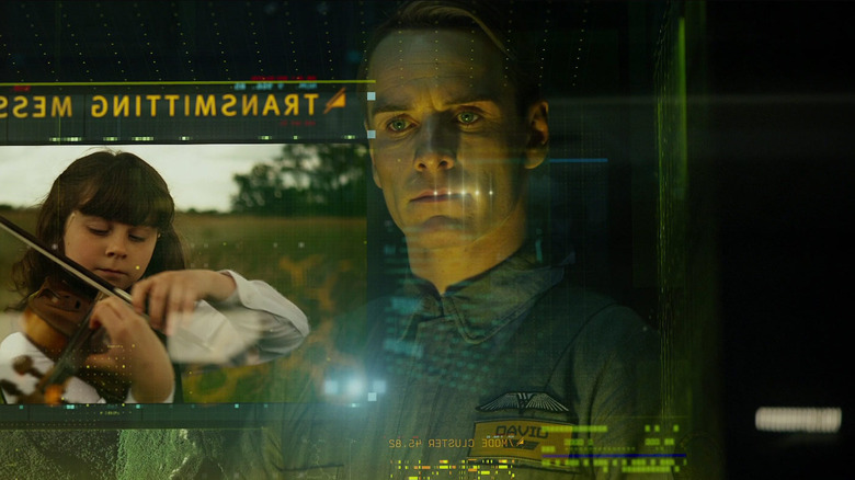 Michael Fassbender as David studying a holographic image in Prometheus