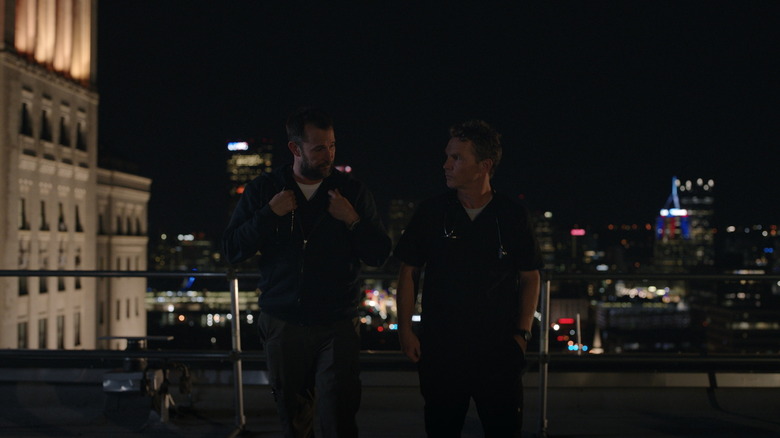 Robby and Abbot leaving the rooftop on The Pitt