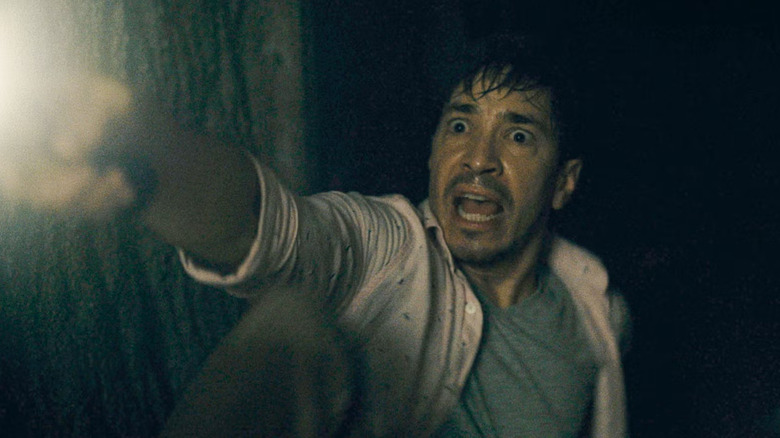 Aj, the fearful appearance, carries a manual lamp in a dark cellar in the barbarian