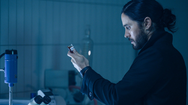 Dr. Michael Morbius filling a vial of medicine in Morbius