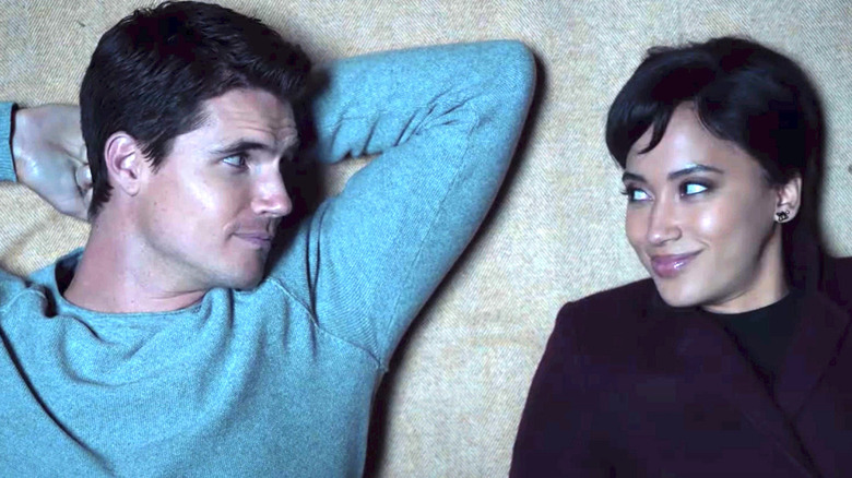 Robbie Amell and Andy Allo as Nathan and Nora in Upload