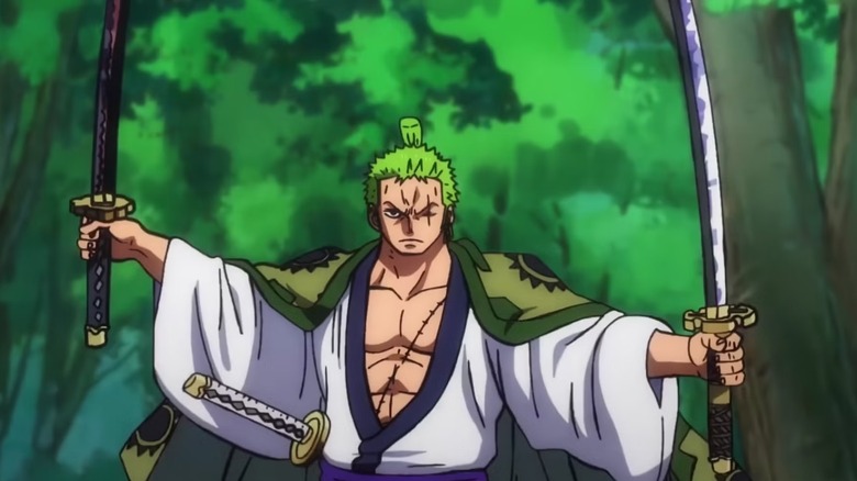 Roronoa Zoro holds two swords in a forest on One Piece