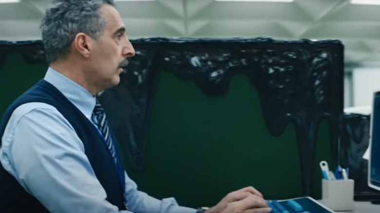 John Turturro's Irving in a goo-covered cubicle on Severance