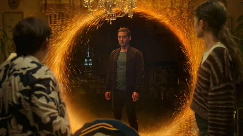 Tobey Maguire as Peter Parker stands inside a portal in Spider-Man: No Way Home