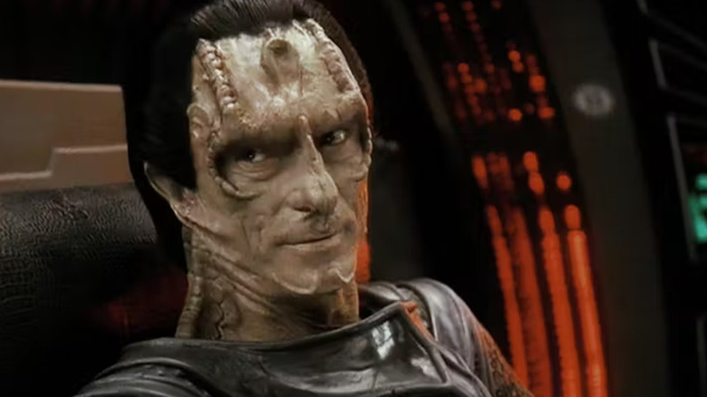 Gul Dukat (Marc Alaimo) looks across the table while formulating a plan in Star Trek: Deep Space Nine