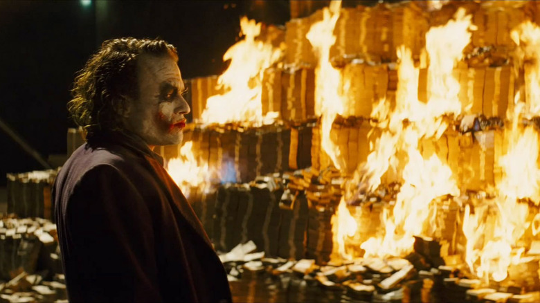 The Dark Knight Joker burning money 