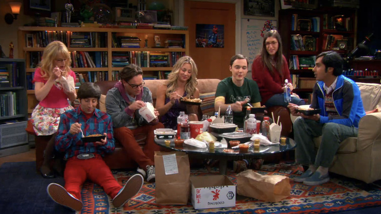 The full core cast of The Big Bang Theory, gathered in Sheldon and Leonard's apartment.
