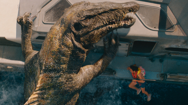 A Spinosaurus attacks a boat in Jurassic World Rebirth