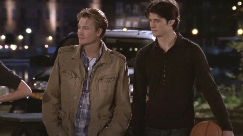 Chad Michael Murray's Lucas Scott stands alongside James Lafferty's Nathan Scott while standing outside in One Tree Hill
