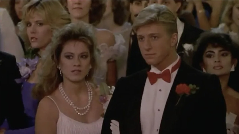 Denise and Greg in the audience at the prom in Just One of the Guys