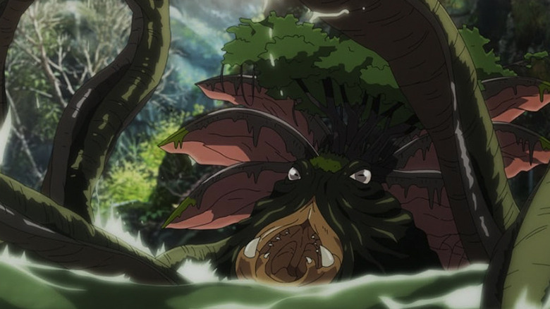 Una criatura del pantano que emerge del agua con la boca abierta y un árbol en la cabeza en La Guerra de los Rohirrim.
