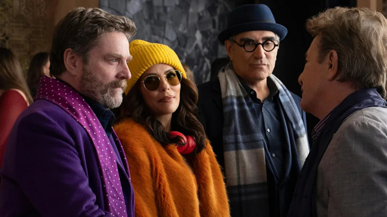 Zach Galifianakis, Eva Longoria, and Eugene Levy meeting Oliver in Only Murders in the Building