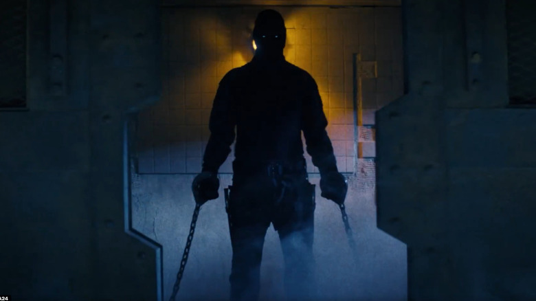 The Butcher in chains at the facility in Onslaught