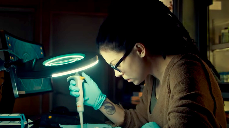 Tatiana Maslany performs a lab test on Orphan Black