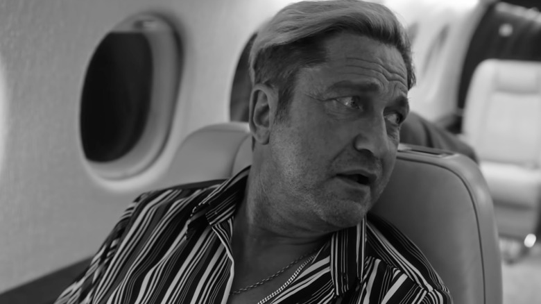 Gerard Butler sports a blond dye job as Louie in In the Hand of Dante