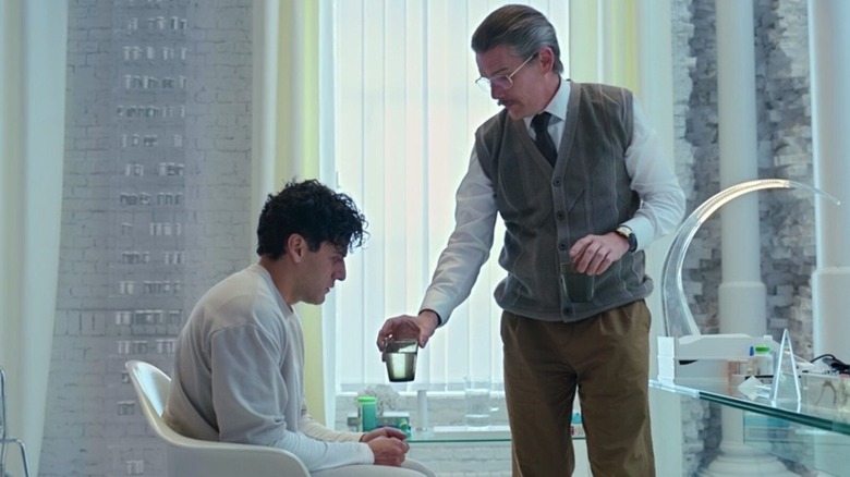 Oscar Isaac as Mark Spector, Ethan Hawke as Dr. Harrow in Moon Knight
