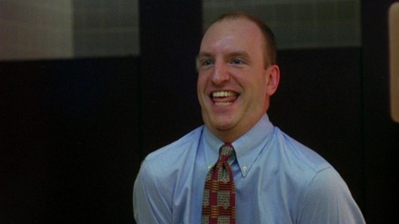 Fletcher Munson making faces in the mirror in Schizopolis