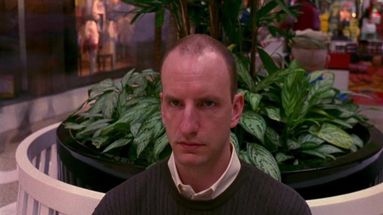 Fletcher Munson sitting still in a mall in Schozopolis.
