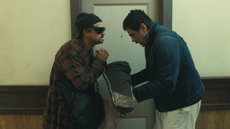 Leonardo DiCaprio bowing to Benicio del Toro in One Battle After Another