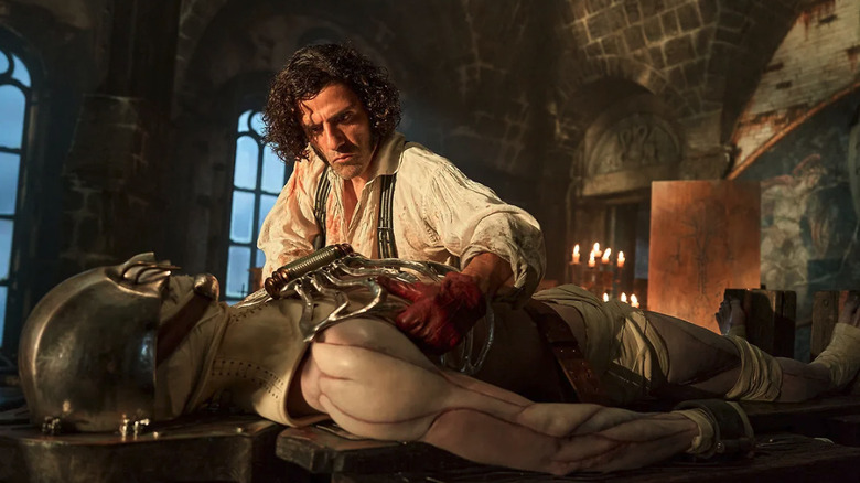 Oscar Isaac rigging Jacob Elordi in Frankenstein