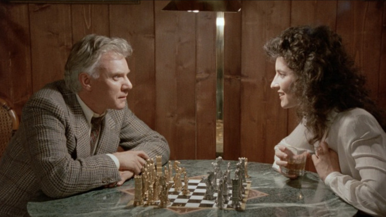 The Caller and The Girl play a game of chess in The Caller