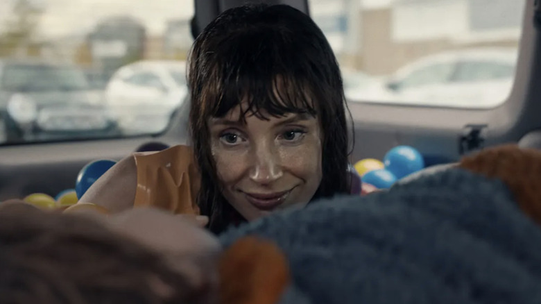 Other Mommy creeps up from the back seat in Other Mommy