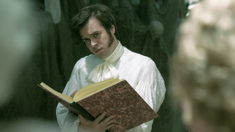 Nathan Foad as Lucius with Stede's journal in Our Flag Means Death