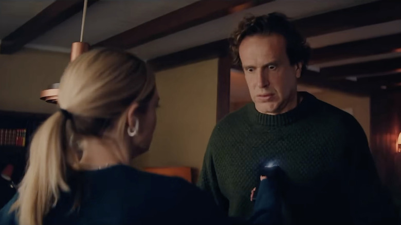 Lisa tasing Dan in Over Your Dead Body