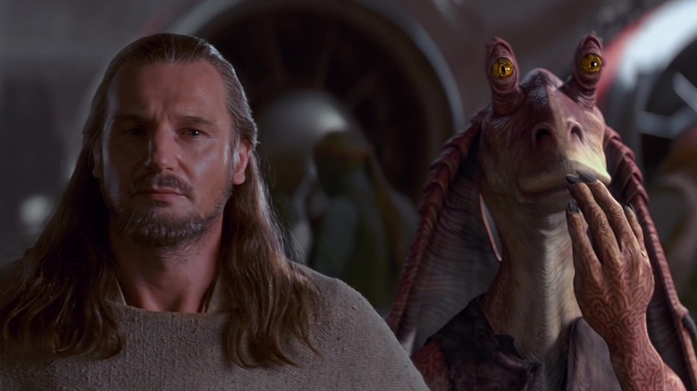 Qui-Gon Jinn standing next to a panicking Jar Jar Binks in Star Wars: The Phantom Menace